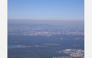 Haze obscures many urban areas, like Frankfurt, Germany.