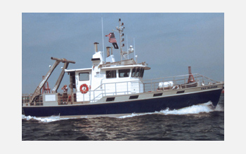 Dobbs, Lyons and colleagues collect water samples from a research vessel.