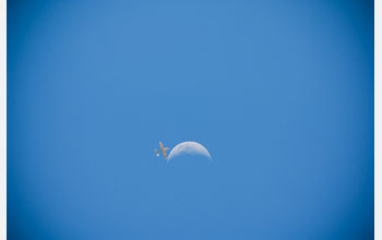 An AUAV crossing the crescent moon.