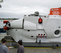 Researchers and the starboard profile of Alvin on the fantail of its support vessel