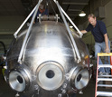 Two technicians working on the new Alvin personnel sphere