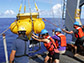 scientists and crew of the R/V Atlantic Explorer recover a deep ocean sediment trap