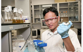 Photo of a student getting experience in the lab.