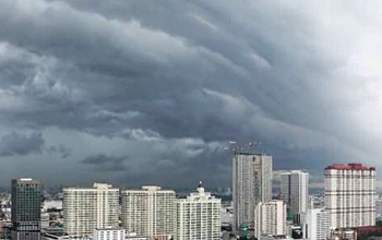 storm clouds over city in Asia