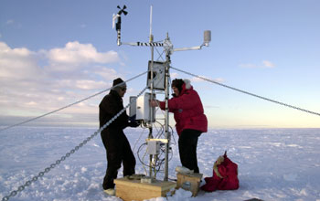 Installing weather instruments on iceberg B-15A