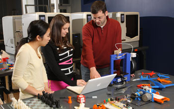 students with 3-D printer