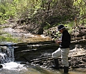 Geologist Gerta Keller looks at sediment samples along the Brazos River in Texas.