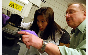 Nattharika Aumsuwan and Marek Urban, part of team who developed antibiotic coating process.