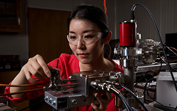 Researcher and mini mass spectrometer