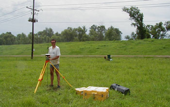 Torbjörn Törnqvist determining the elevation of a GPS-antenna in the Mississippi Delta.