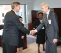 NSF's David Stonner, Machi Dilworth and Cora Marrett greet Russian Science Minister Andrei Fursenko.