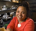 Female scientist in lab with geologic samples