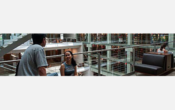 Photo of two students at Ohio State's Thompson Library.