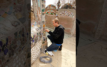 Installing crack displacement sensors on central tower of Watts Towers