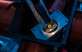 Micron-sized magnetic particles ready to spin in a rig