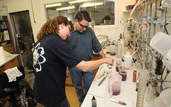 Students analyze for titratable acidity in fermented juices during field practicums.