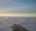 A view from the King Air as it skims across the tops of clouds above Idaho's Payette Basin.