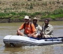 Frank Brown crossing the Omo River accompanied by Tamrat Haile Mariam and Zmaneh Shugut.