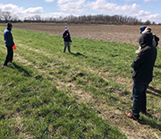 Members of the SAVANT team checking topography for the project.