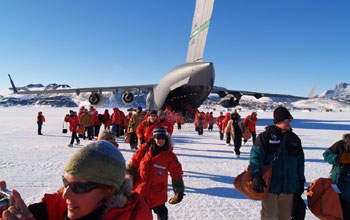 Passengers deboarding the plane in antarctica.