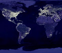 Map of the night-time city lights of the world, growing in extent each year.