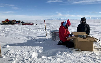 Researchers on Antarctic ice.