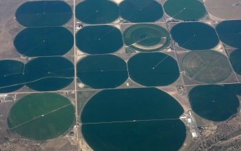 This aerial photo was taken east of Denver, Colorado, above a region dense with irrigation systems.