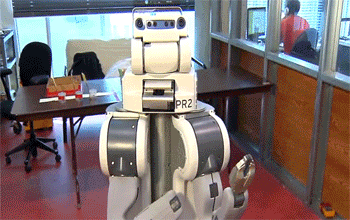animated gif showing humanoid robot Robotina of MIT picking legos