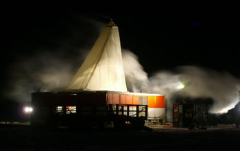 drilling rig at night