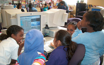 children working on computers