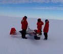 scientists with a UAS