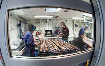 Photo of scientists using laboratories aboard the JOIDES Resolution to analyze expedition samples.