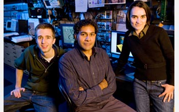 Photo of Chris Moon (left), Hari Manoharan and Laila Mattos (right), the subatomic writing team.