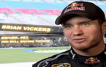 Close up of race car driver and words Brian Vickers Driver, #83 Red Bull Racing Toyota