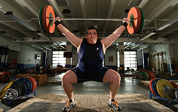 Athlete Sarah Robles lifting weights