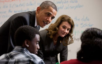 Photo of President Obama and Melinda Gates visiting a TechBoston classroom.