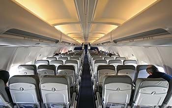 passengers seated on airplane