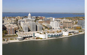 An aerial view of Madison, Wis., with Lakes Monona (foreground) and Mendota (background).