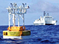 a buoy at Station ALOHA north of O'ahu, with UH Manoa vessel, Kilo Moana