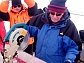 Lonnie Thompson cuts an ice core