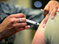 a person getting the flu vaccine shot