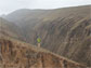 Fulong Cai stands on a linear ridge