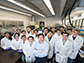 Gang Wu in his lab with his students