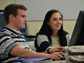 two people working on a computer