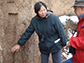 Weijian Zhou (left) and Warren Beck (right) examining layers of loess soil