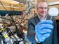 Michael Manfra holds a gallium-arsenide wafer