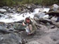 collecting a sand sample at the Rapid Creek