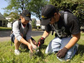 students collect samples of soil