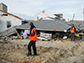 researchers assessing storm damage