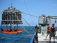 researchers collecting water samples